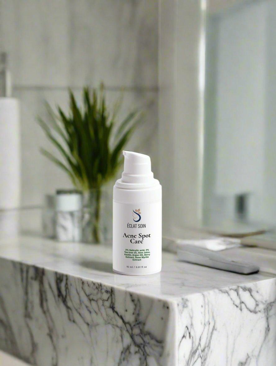 Eclat Soin Acne Spot Care for Sensitive Skin in a sleek bottle on a marble countertop